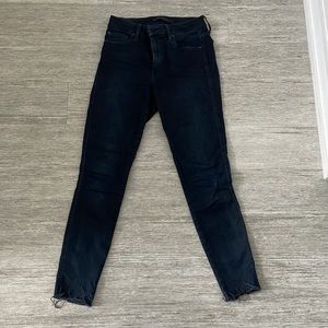 Dark blue high rise Joe’s Jeans size 27 with stretch and raw edge hem